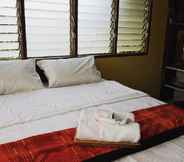 Kamar Tidur 7 Aum Hum Homestay