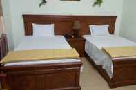 Kamar Tidur Cat Dai Hotel