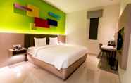 Bedroom 4 ZOOM Dharmahusada Hotel