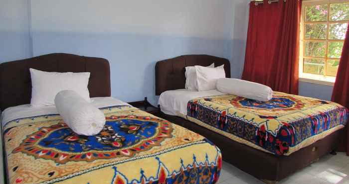 Bedroom Hotel Merlin Waingapu