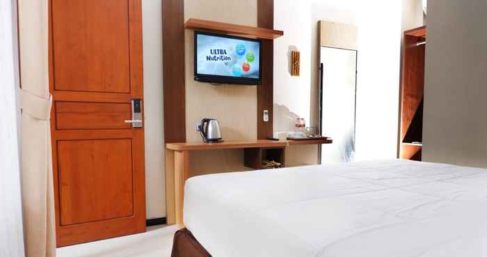 ห้องนอน Hotel Wisma Djaja Syariah