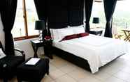 Kamar Tidur 2 8 Suites by Fat Jimmy's