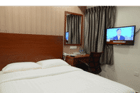 ห้องนอน Elegant Hotel