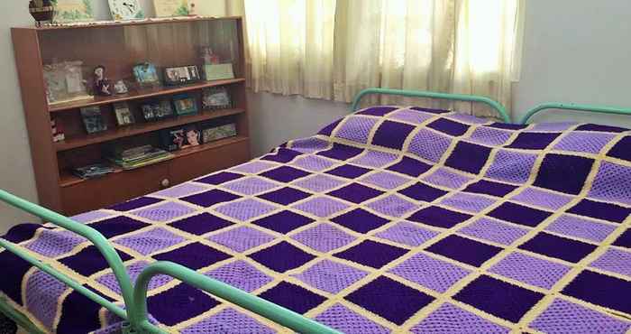 Bedroom Astani Family Home
