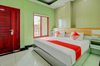 Kamar Tidur OYO 2077 Batukaru Garden 3