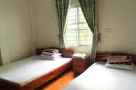 ห้องนอน Huong Tra Motel