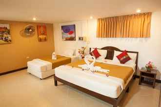 Kamar Tidur 4 Rich Resort Beachside Hotel