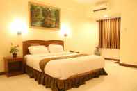 ห้องนอน Candisari Syariah Hotel & Resto