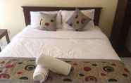 Kamar Tidur 5 Reynold Artha Guest House