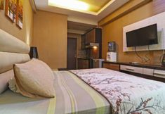 Bedroom 2 The Suite Metro Apartement by Putri King