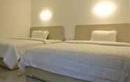 Kamar Tidur 6 Uni Beach Hotel