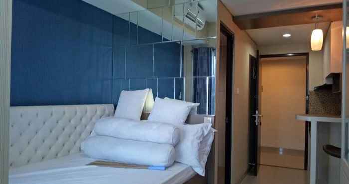 ห้องนอน Studio Room at Tamansari Papilio Apartment Surabaya (33) by HUM'Z