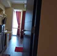 Bedroom 4 Studio Room Pool View at Tamansari Papilio Apartment Surabaya (32) by HUM'Z