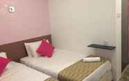 Kamar Tidur 4 M Motel Meru