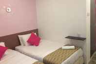 Kamar Tidur M Motel Meru