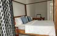 Kamar Tidur 2 Vivid Garden Homestay