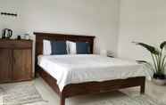 Kamar Tidur 7 Vivid Garden Homestay