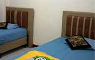 Kamar Tidur 2 Hotel Hujan Emas