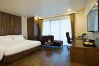 Bedroom Poonsa Hanoi Hotel