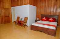 Bedroom OYO 1278 Wina Beach Hotel