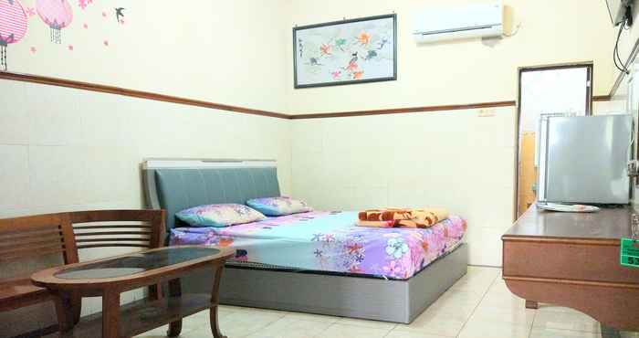 Kamar Tidur Hotel Naga Mas