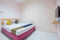 Kamar Tidur SPOT ON 2214 Wisma Jampea