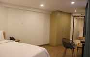 Kamar Tidur 5 Saigoneer Hotel