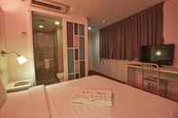 ห้องนอน Sakura Boutique Hotel