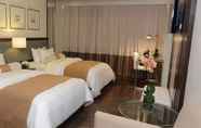 Kamar Tidur 2 The Carmen Hotel