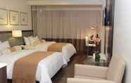 Kamar Tidur 5 The Carmen Hotel