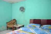 Bedroom Uncle Jack Beach Homestay 3 (AYG3)