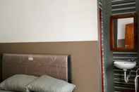 Kamar Tidur HTM Guesthouse