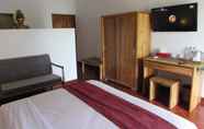 Kamar Tidur 3 Cokelat Guesthouse