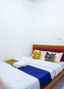 BEDROOM OYO 2718 Backpacker's Homestay Jlegong