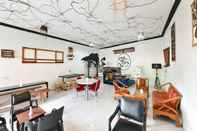 ร้านอาหาร OYO 1074 Homestay Rumah Puti