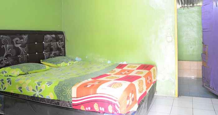 Bedroom Uncle Jack Beach Homestay 2 (AYG2)