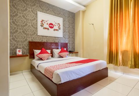 寝室 OYO 615 Residence Puri Hotel Syariah