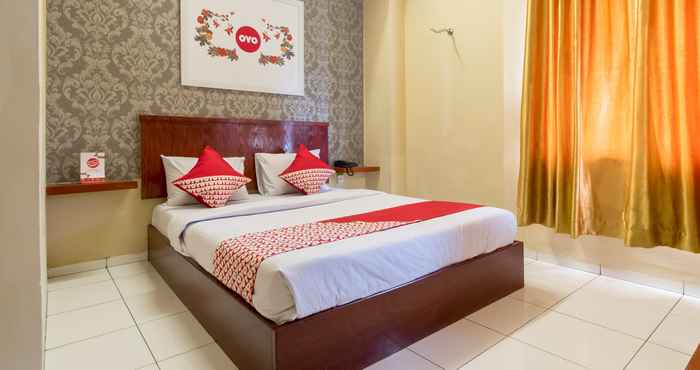 Kamar Tidur OYO 615 Residence Puri Hotel Syariah