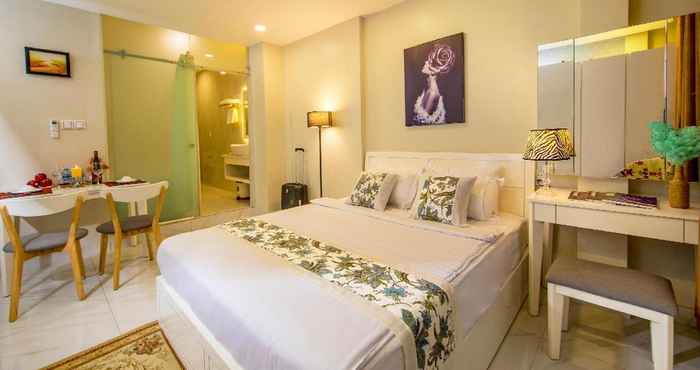 Kamar Tidur Cherish Central Hotel & Apartment