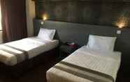 Bedroom 7 Check Inn Hotel Tawau