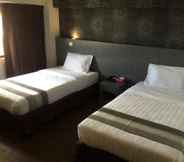 Bedroom 7 Check Inn Hotel Tawau