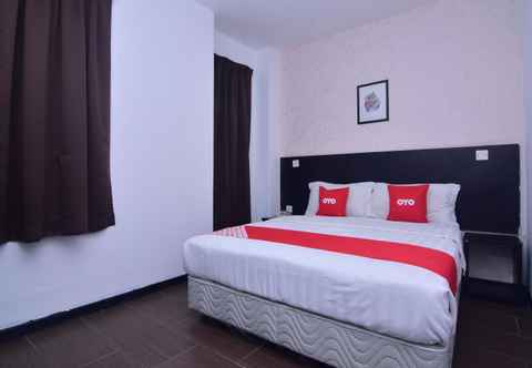 Bedroom OYO 43959 Astana Hotel