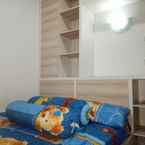 BEDROOM Deluxe Two Bedroom at Apartment Puncak Kertajaya Surabaya (DIO V)