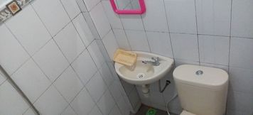 In-room Bathroom 6 Value Room at Tanjung Inn