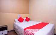 Kamar Tidur 5 D'pinetrees Hotel