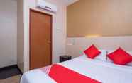 Kamar Tidur 6 D'pinetrees Hotel