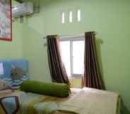 Bedroom 6 Amien Guest House Syariah