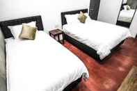 Bilik Tidur Rock Wood Hotel