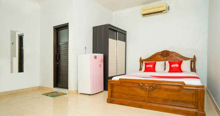 Kamar Tidur OYO 2181 Hotel Grand Yuda