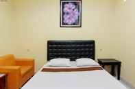 Kamar Tidur Hotel Popi (Pondok Pisang)